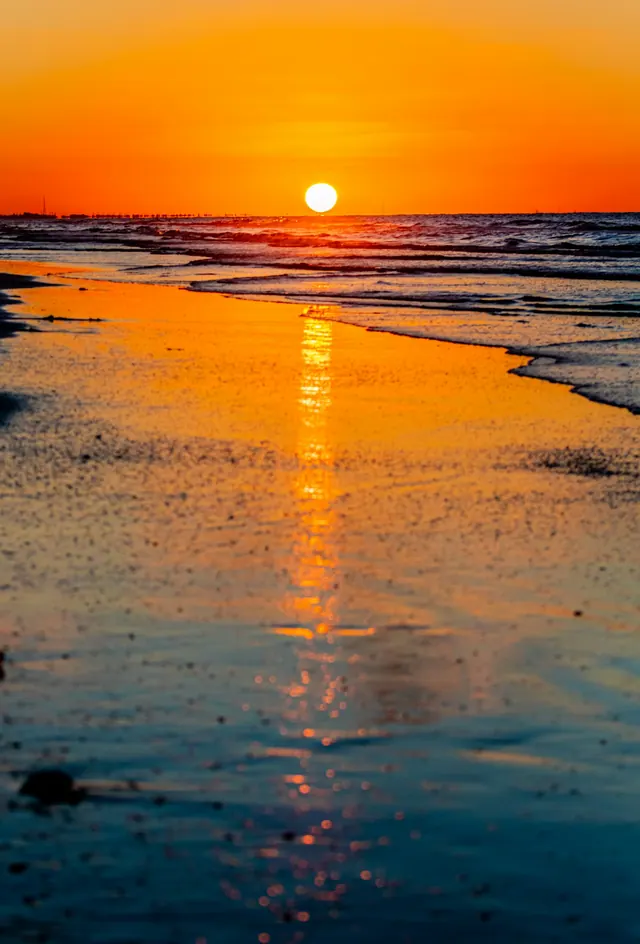 Solnedgång vid havet i New Damietta