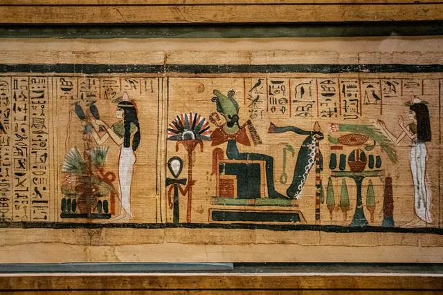Illustrationsbild: papyrus med målade egyptiska figurer